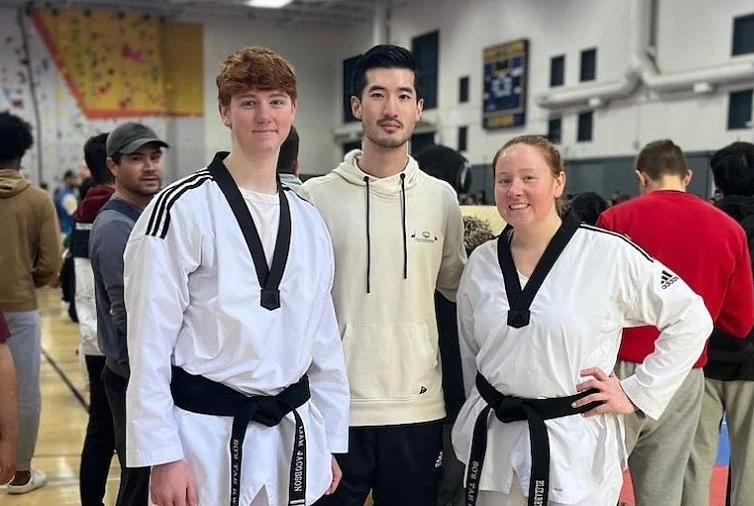 Taekwondo Siblings and their instructor